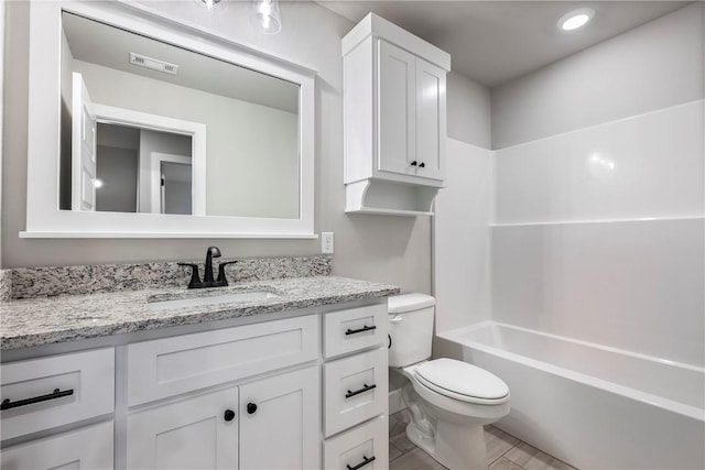 full bath with bathtub / shower combination, visible vents, vanity, and toilet