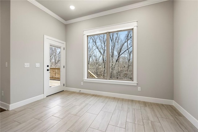 interior space featuring crown molding, recessed lighting, and baseboards