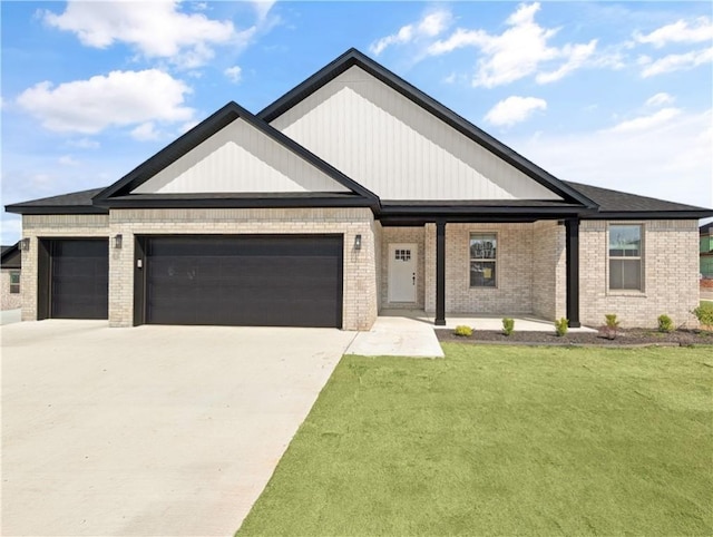 modern inspired farmhouse featuring brick siding, a front yard, driveway, and an attached garage