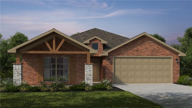 view of front facade featuring a garage and a lawn