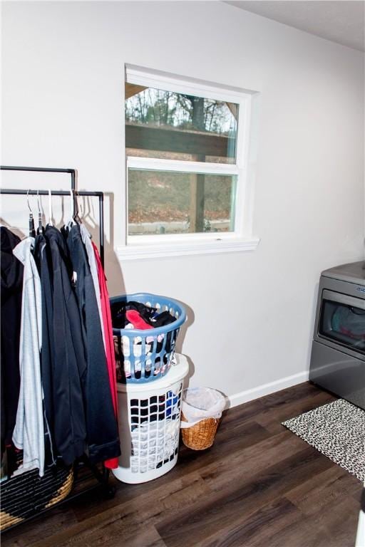 mudroom with plenty of natural light, baseboards, and wood finished floors