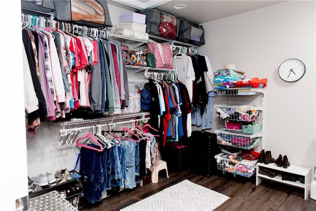 spacious closet with wood finished floors