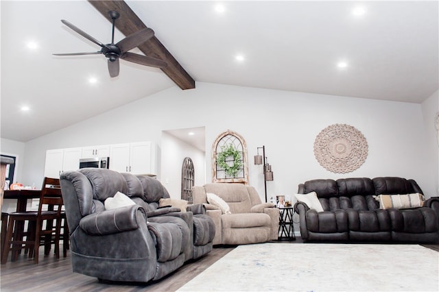 living room with beam ceiling, hardwood / wood-style flooring, high vaulted ceiling, and ceiling fan