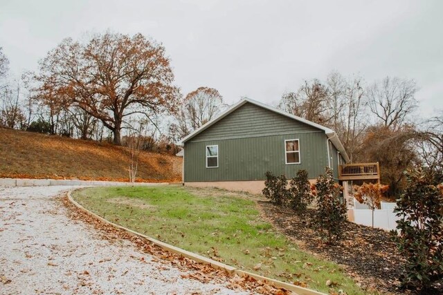 view of home's exterior featuring a yard