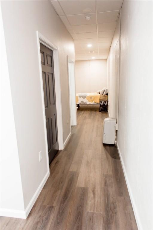 corridor featuring hardwood / wood-style flooring