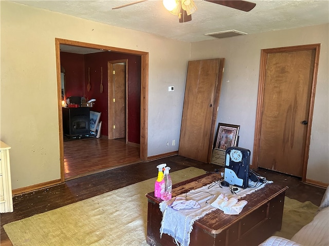 home office with ceiling fan and wood-type flooring