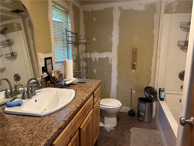 bathroom featuring tile patterned flooring, vanity, and toilet