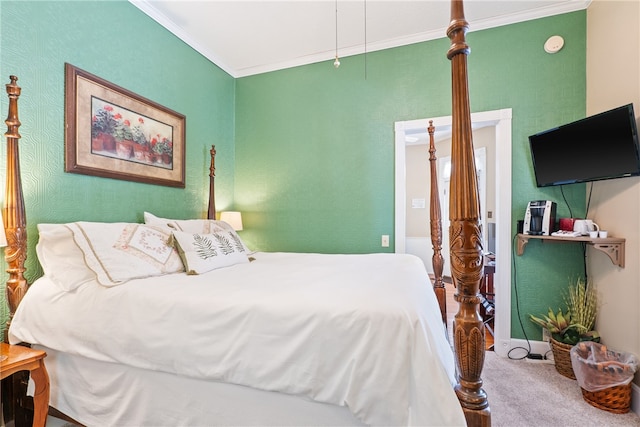 carpeted bedroom featuring crown molding