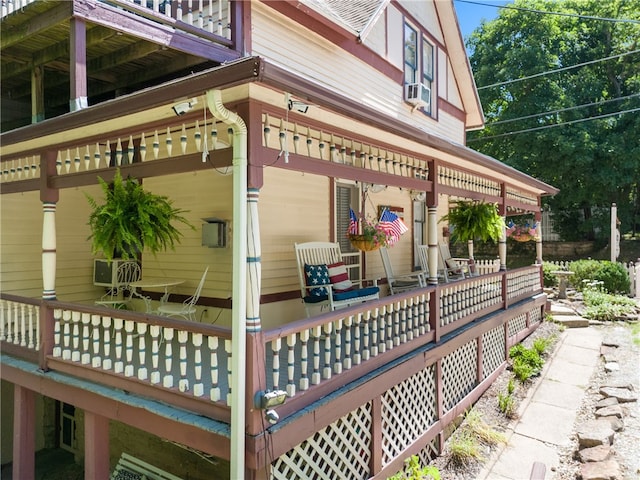 view of side of home with a deck