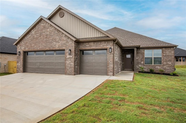 7843 Range Ave, Springdale, AR 72762 - view of front of home with a garage, board and batten siding, driveway, brick siding, and a front lawn