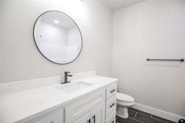 7843 Range Ave, Springdale, AR 72762 - bathroom with vanity, toilet, tile patterned floors, and baseboards
