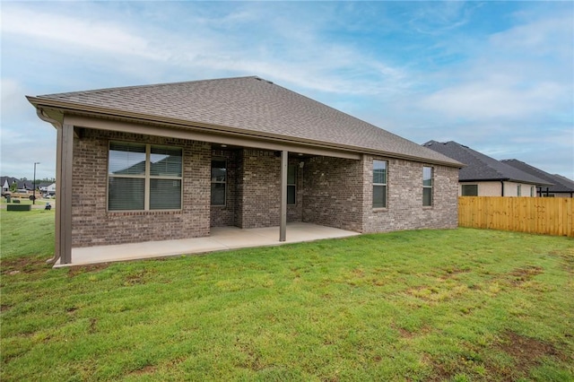 7843 Range Ave, Springdale, AR 72762 - rear view of property featuring brick siding, a patio, and roof with shingles