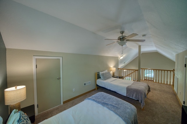 carpeted bedroom with vaulted ceiling and ceiling fan