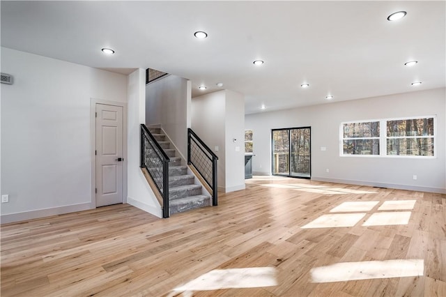 spare room with light hardwood / wood-style flooring