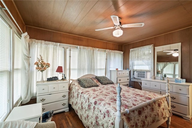 bedroom featuring multiple windows, ceiling fan, dark hardwood / wood-style flooring, and wooden ceiling