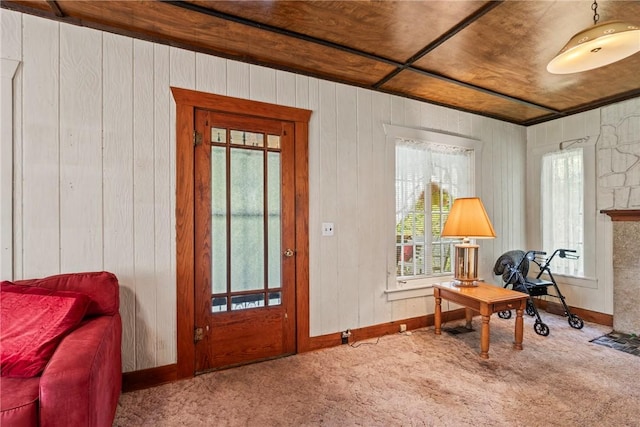 interior space with plenty of natural light, carpet floors, and wood ceiling