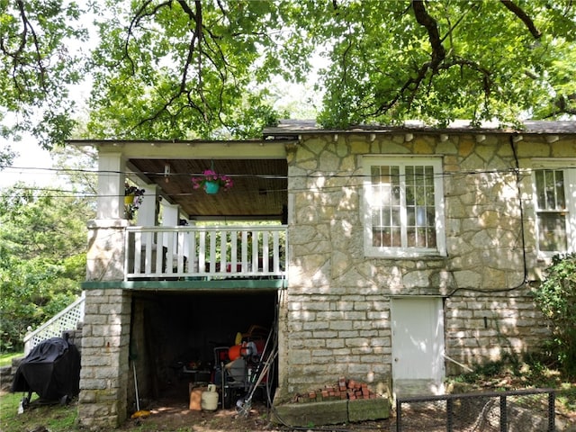 rear view of house with a balcony