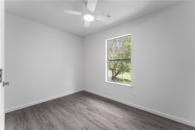 unfurnished room featuring ceiling fan and hardwood / wood-style floors