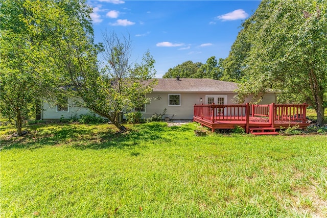 view of yard with a wooden deck