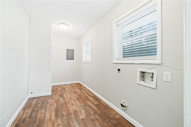 laundry area with hookup for an electric dryer, washer hookup, electric panel, and dark wood-type flooring