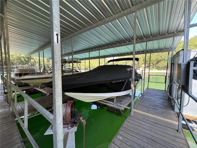 view of dock with boat lift