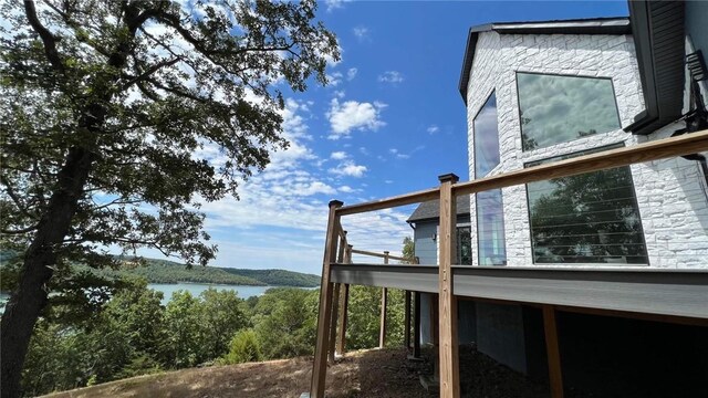 view of side of home featuring a water view