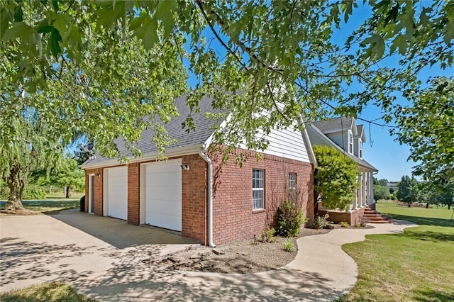 view of side of property featuring a garage