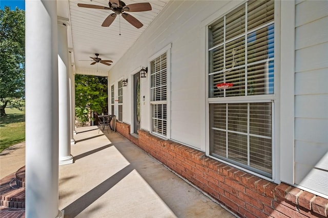 view of patio / terrace with ceiling fan and a porch