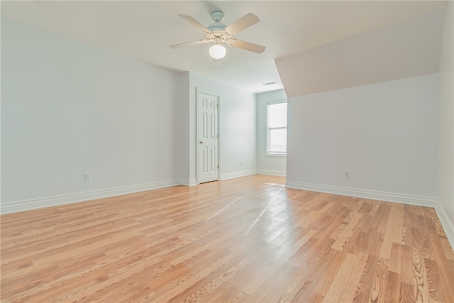 unfurnished room featuring ceiling fan and light wood-type flooring