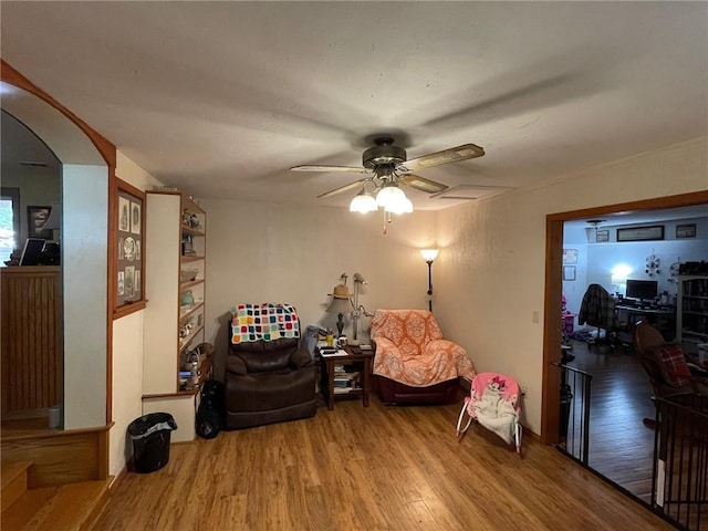 sitting room featuring hardwood / wood-style flooring and ceiling fan