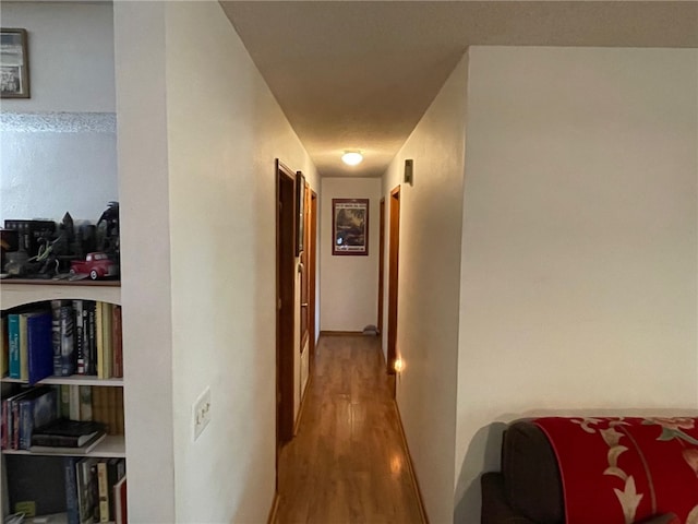 hall featuring wood-type flooring