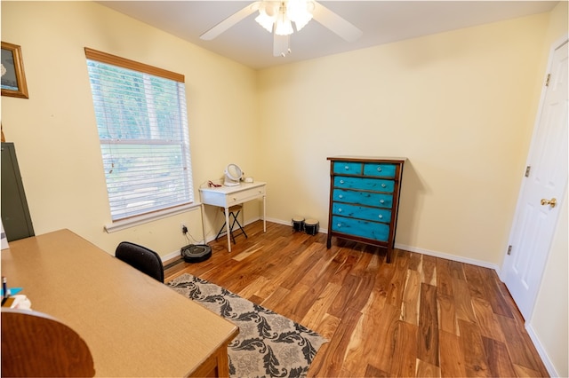 office space featuring dark hardwood / wood-style floors and ceiling fan