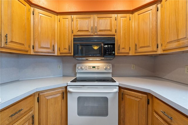 kitchen featuring white electric stove