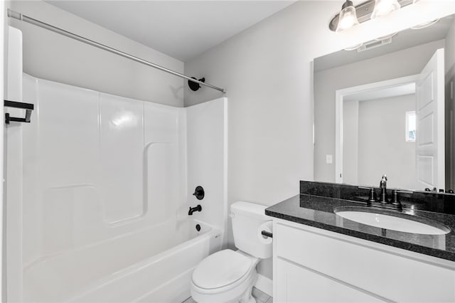 full bathroom featuring toilet, shower / washtub combination, and vanity