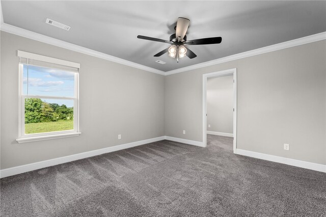 carpeted empty room with ceiling fan and ornamental molding