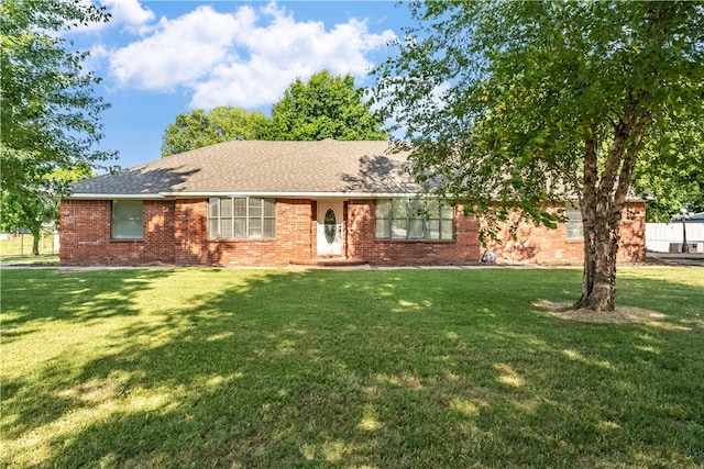 ranch-style house with a front yard