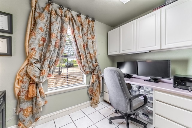 office area featuring light tile patterned flooring