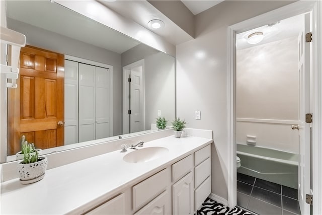 full bathroom featuring tile patterned flooring, shower / bathing tub combination, toilet, and vanity