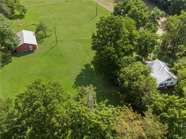 birds eye view of property featuring a rural view