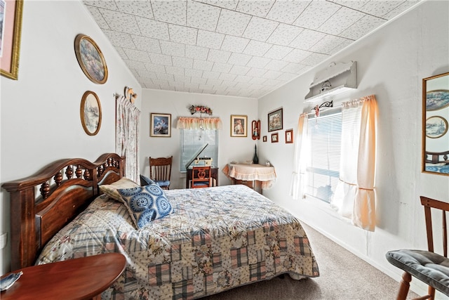 bedroom featuring carpet