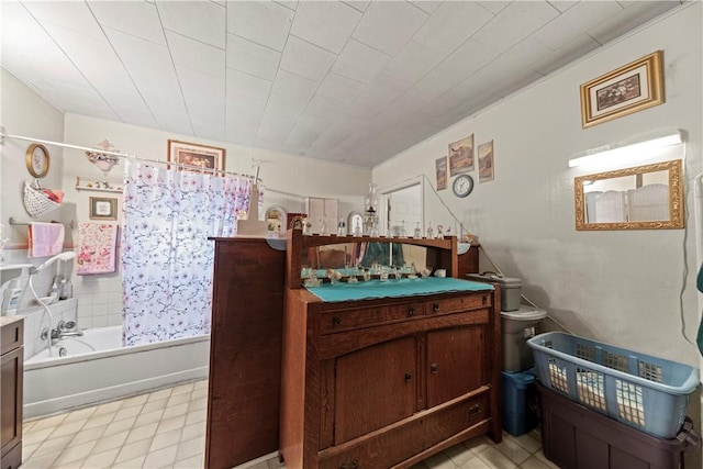 bathroom with shower / bath combination with curtain and vanity