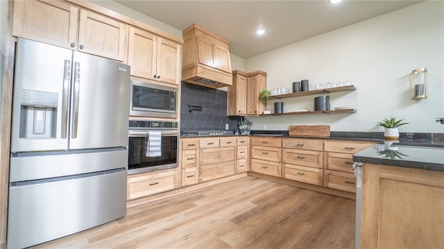 kitchen featuring stainless steel appliances, light hardwood / wood-style floors, decorative backsplash, custom exhaust hood, and light brown cabinetry