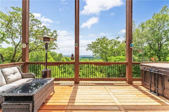 wooden deck featuring outdoor lounge area