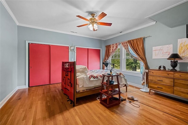 bedroom with wood-type flooring, ornamental molding, and ceiling fan