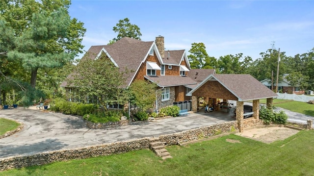 view of front of home with a front yard