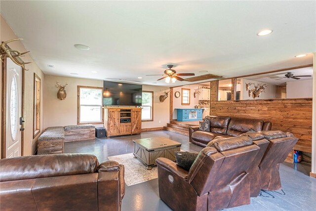 living room featuring ceiling fan