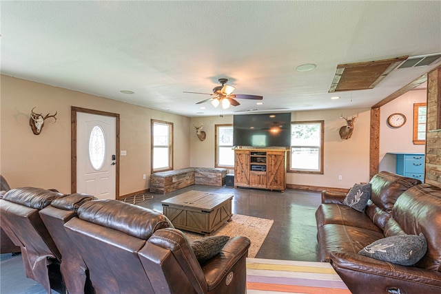 living room featuring ceiling fan