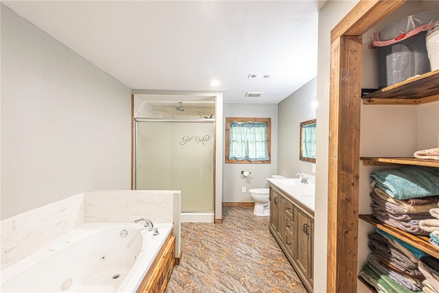 full bathroom with vanity, tile patterned flooring, toilet, and separate shower and tub