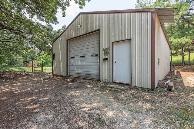 view of outdoor structure with a garage