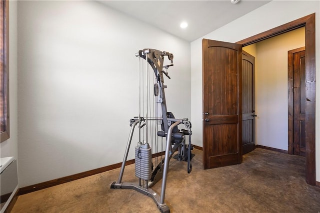 workout room featuring dark carpet, baseboards, and recessed lighting